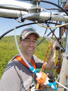 Strapped into a safety harness, Richard Wehr works on a flux tower monitoring the Harvard Forest Environmental Measurements Site. (Photo: Richard Wehr) Strapped into a safety harness, Richard Wehr works on a flux tower monitoring the Harvard Forest Environmental Measurements Site. (Photo: Richard Wehr)
